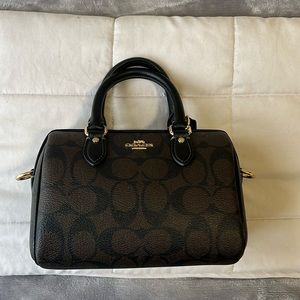 Dark brown signature coach bag. Mini Rowan bag.